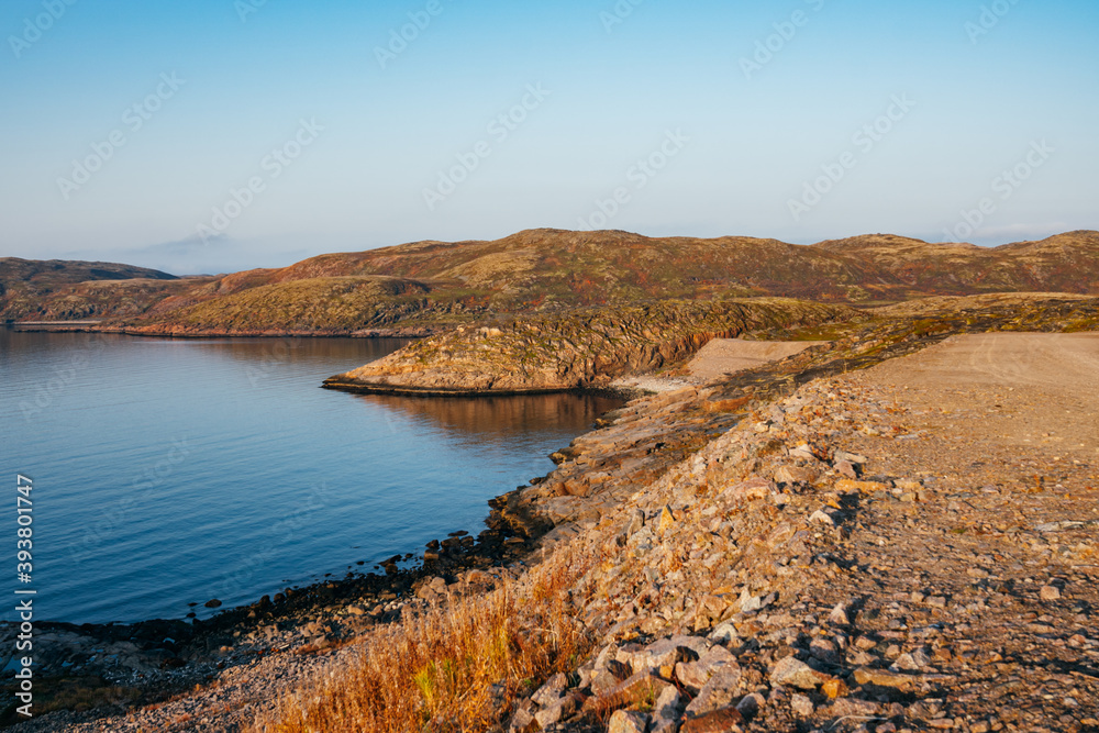 The rocky beach on the coast of the Barents Sea in the north of Russia.
Russian polar region, Kola Peninsula, overlooking the Barents sea the Arctic ocean, Murmansk oblast
