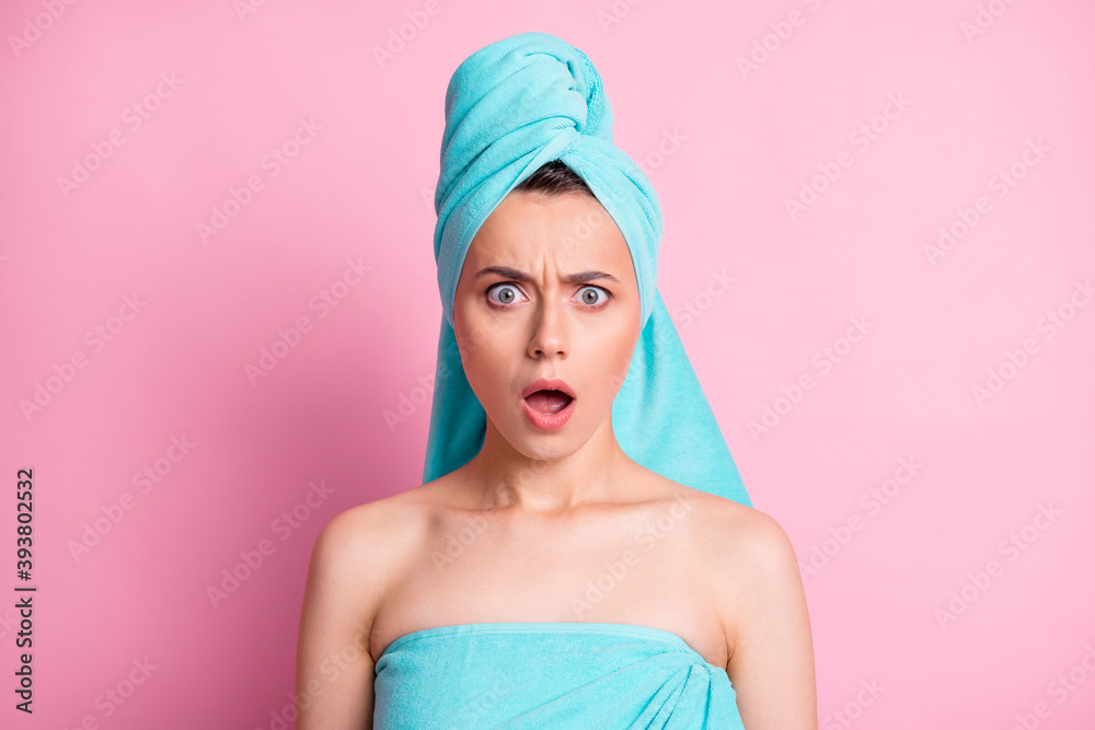 Portrait of shocked nice young lady open mouth wear teal bath towels on head body isolated on pink color background Portrait of shocked nice young lady open mouth wear teal bath towels on head body isolated on pink color background