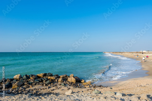 Waves flushing the beach at Ras Al Khaimah, UAE