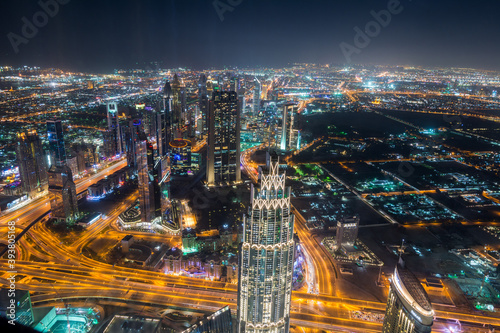 Obraz na plátně Night aerial view of Dubai from the top of  Burj Khalifa Tower in Dubai, United Arab Emirates, the tallest building in the world