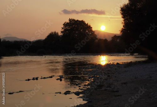 Greece sunse at the Acheron river in Glyki photo