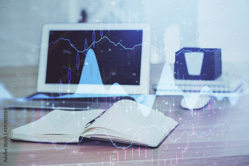 Forex market chart hologram and personal computer background. Multi exposure. Concept of investment. Forex market chart hologram and personal computer background. Multi exposure. Concept of investment.