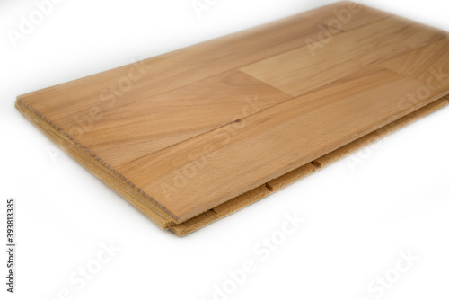 Wooden parquet floor with a click assembly on a white background