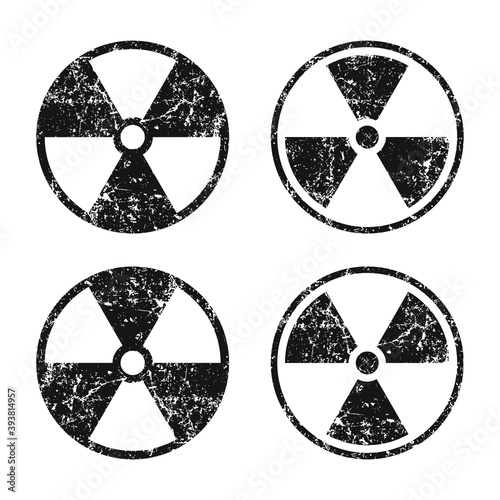 Radioactive symbol icon with grunge texture. Nuclear radiation warning sign. Atomic energy logo label. Vector illustration image.