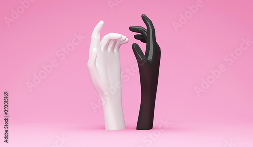 Black and white hands on pink studio background