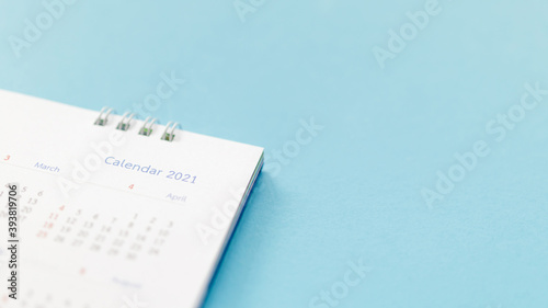 2021 calendar page on blue background business planning appointment meeting concept