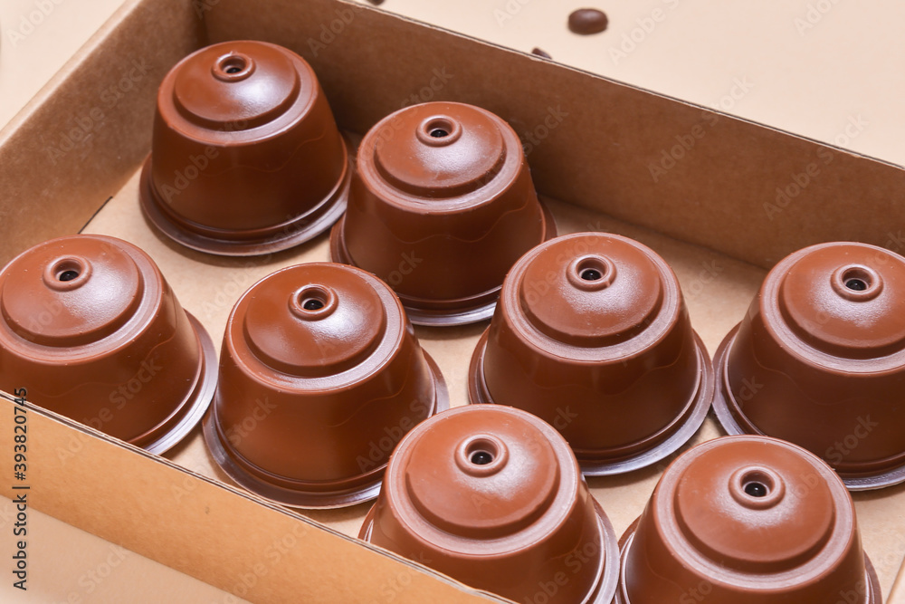 Coffee machine pods, capsules in brown carton box, package Coffee machine pods, capsules in brown carton box, package