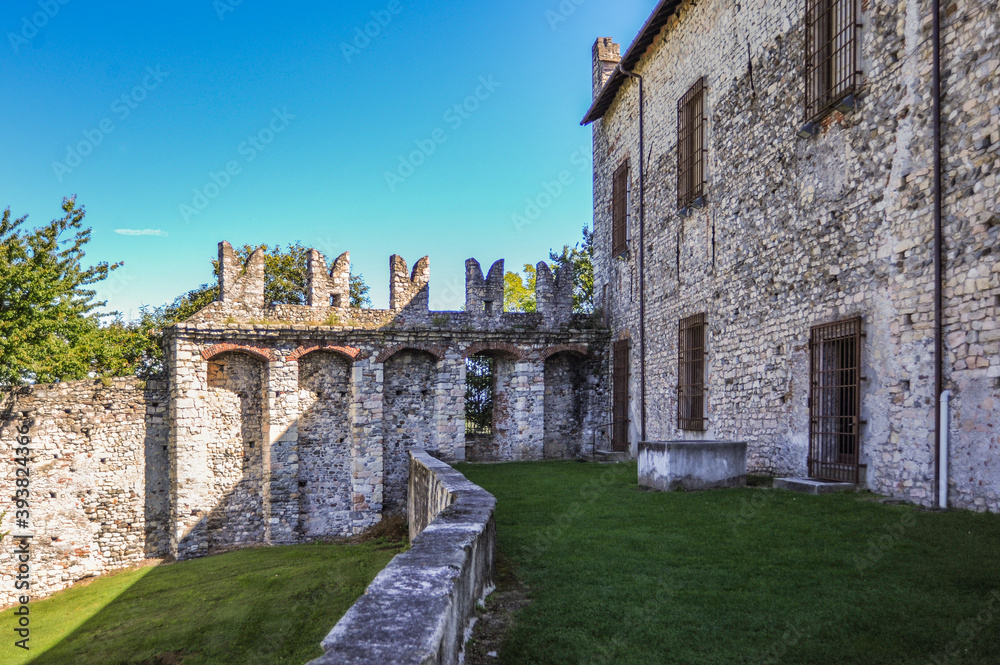 Obraz premium The castle in the village of Angers was founded in 1100. The Visconti family, who then sold the castle to the Borromeo family, created the most notable buildings in the 12-13th centuries. 