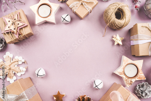 Festive Christmas background with different size gift boxes and Christmas decorations. Top view. Copy space for text.