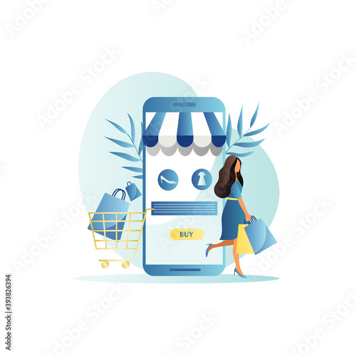 Online store on site, application in smartphone. Girl with paper bags buys things, goods, products on Internet with delivery to her home, office. Woman pays for purchases with credit card contactless.
