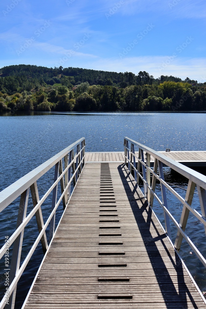 View of a jetty on the shore of a lake
