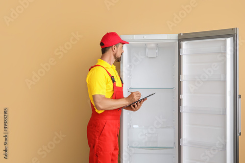 Worker of repair service ne...