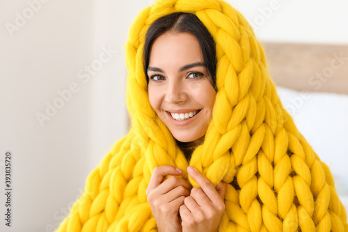Beautiful young woman wrapp...