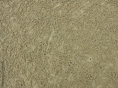 Crab hole on sand beach at Pranburi, Prachuap Khiri Khan, Thailand - habitat of ghost crab ( Ocypode ceratophthalmus ) photo