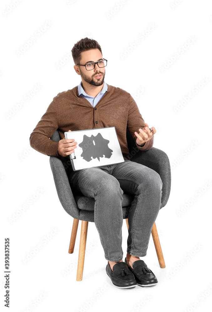 Male psychologist sitting in armchair on white background Male psychologist sitting in armchair on white background