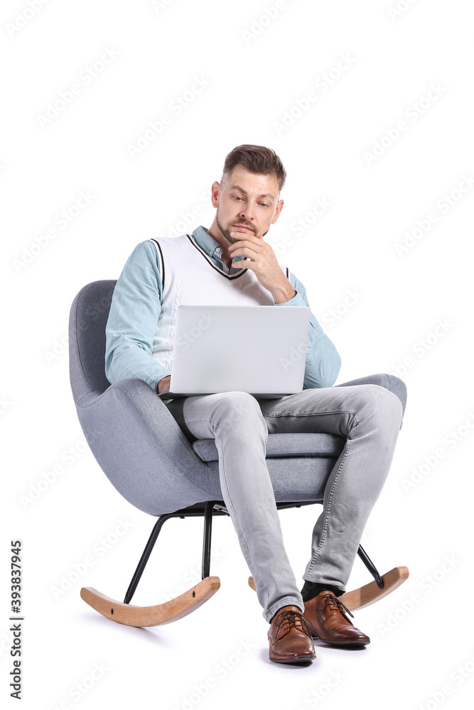 Male psychologist with laptop sitting in armchair on white background Male psychologist with laptop sitting in armchair on white background