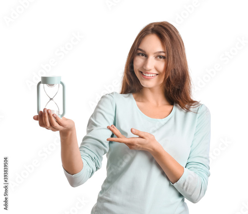 Young woman with hourglass ...
