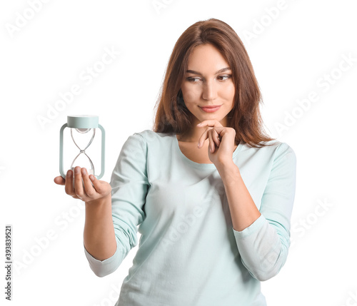 Young woman with hourglass ...