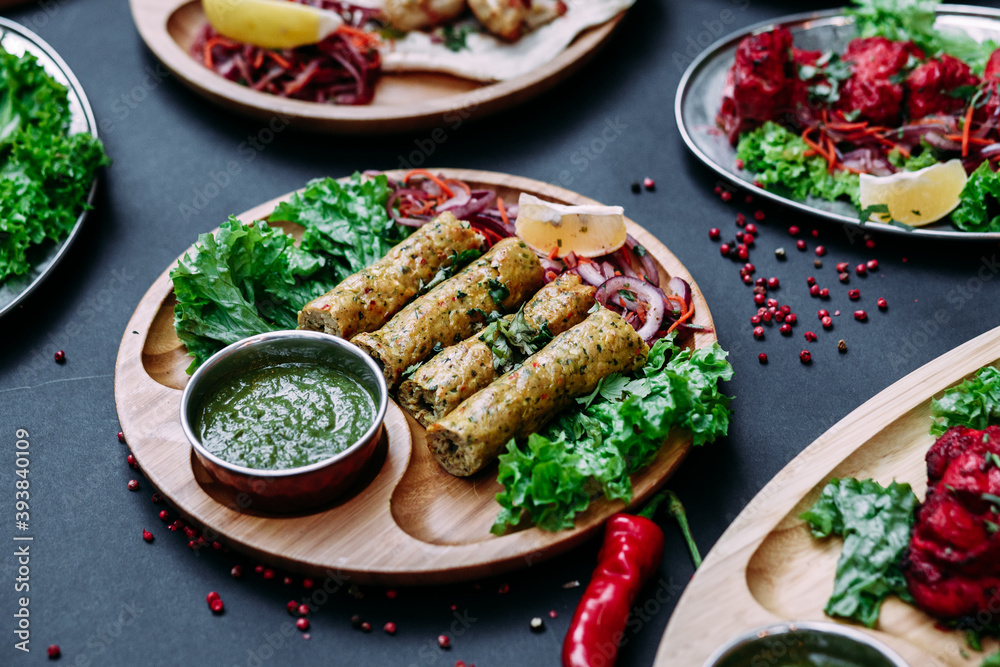 Indian cuisine dishes on black background Indian cuisine dishes on black background