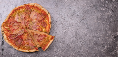 Tasty pepperoni pizza. On wooden background
