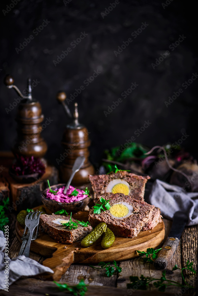 meatloaf with beets and eggs.selective focus..style rustic