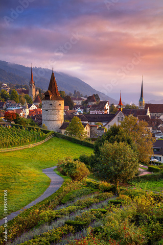 Obraz na płótnie Zug, Switzerland. Cityscape image of Zug at beautiful autumn sunset. w salonie