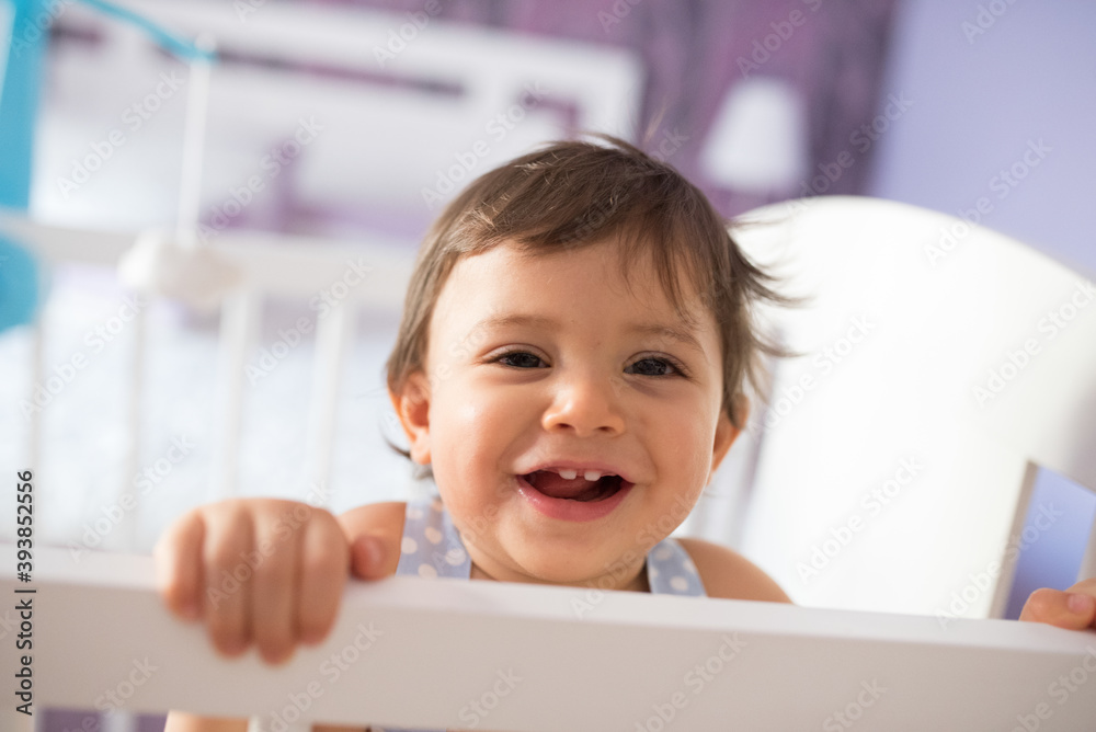 adorable toddler one year old in bedroom crib adorable toddler one year old in bedroom crib
