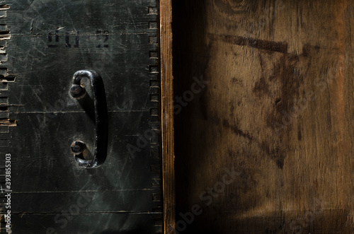 Dark old wooden surface.Grey and brown aged wooden chests as a background photo