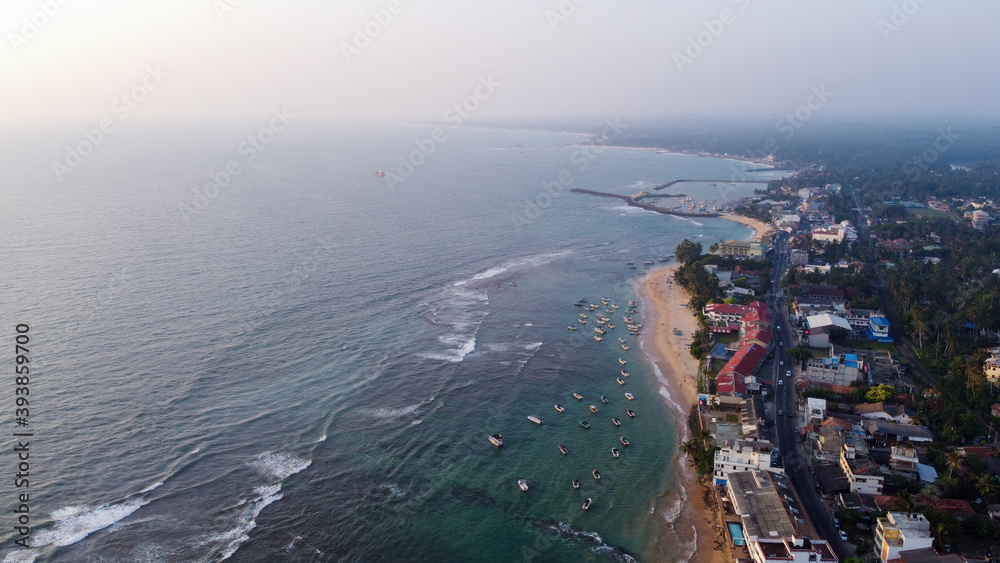 Aerial view of the ocean and the town of Hikkaduwa, Sri Lanka