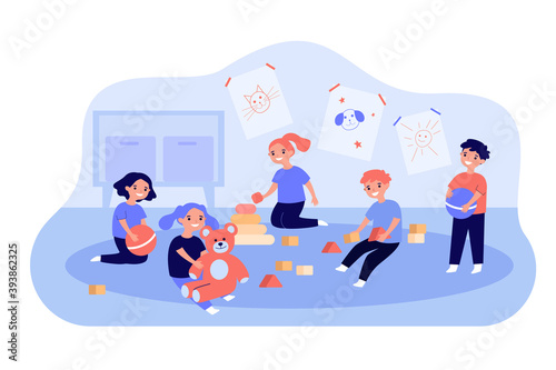 Cute children playing with toy cubes, balls and teddy bear in kindergarten. Vector illustration for childhood, daycare, preschoolers concept