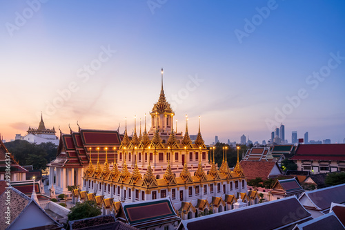 Loha Prasat or Iron Castle Monastery at Wat Ratchanatdaram temple, on Ratchadamnoen Avenue during morning, Bangkok, Thailand photo