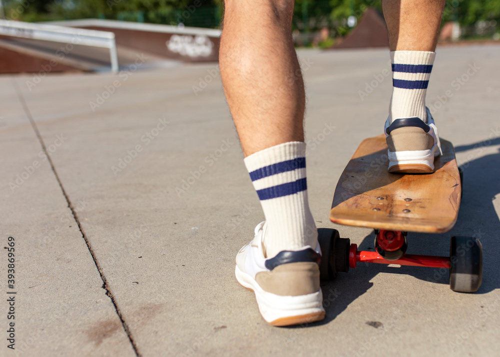 Legs on skateboard