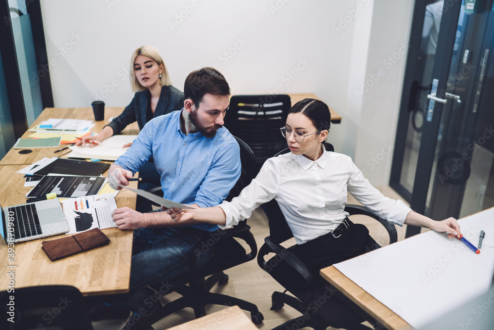 Office colleagues brainstorming business strategy