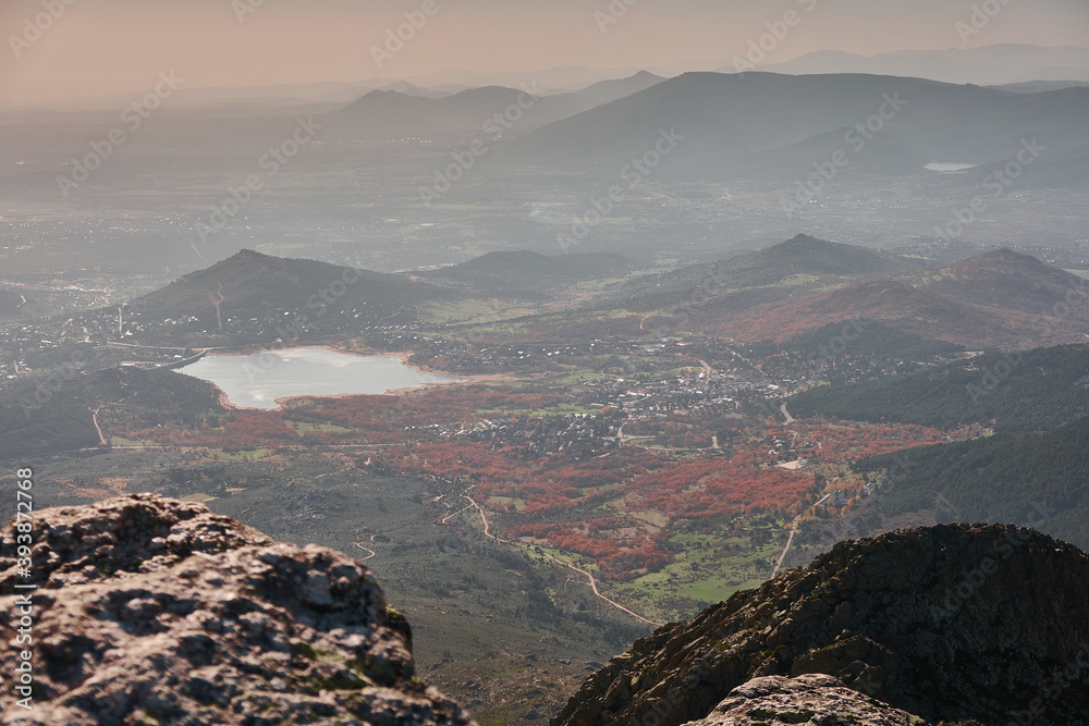 Obraz premium La Maliciosa, La Bola del Mundo, Navacerrada, La Pedriza, El Yelmo and the oak forests in autumn in the Sierra de Guadarrama National Park. Madrid's community. Spain