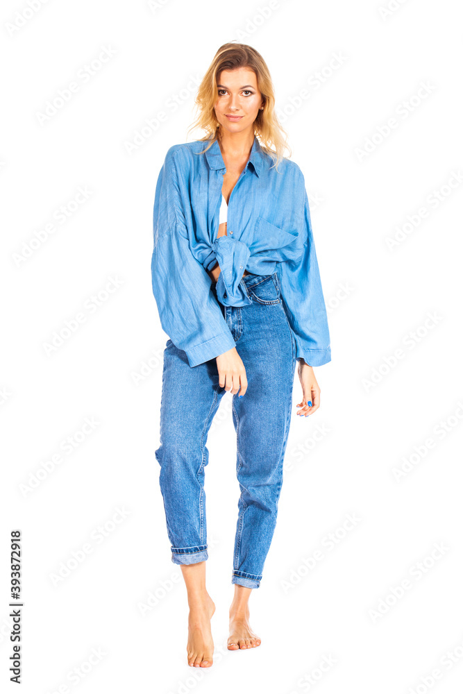 Portrait of blonde woman in blue jeans and shirt isolated on white background Portrait of blonde woman in blue jeans and shirt isolated on white background