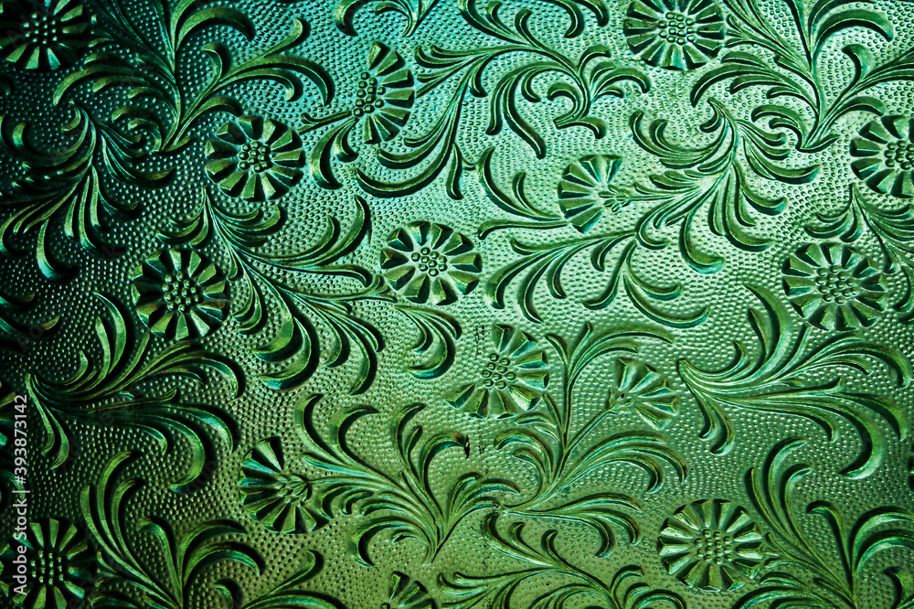 Ancient engraved glass, church door detail Ancient engraved glass, church door detail
