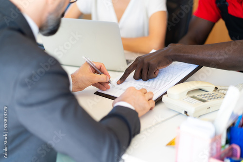 Middle age business man signing a contract