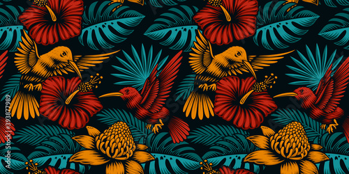 Tropical seamless background with exotic plants and beautiful birds, this design can be used as a fabric print as well as for many other uses