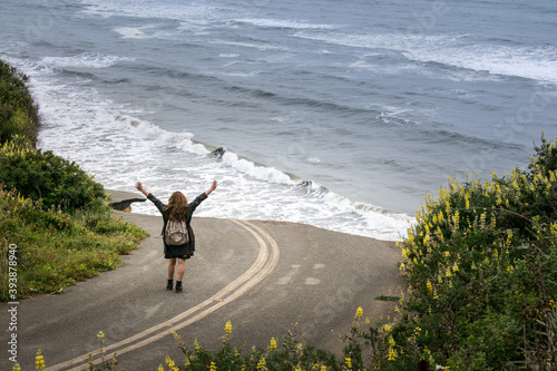 person jumping on the beach