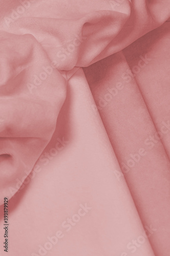 Soft fluffy fabric of different shades, peach shades photo