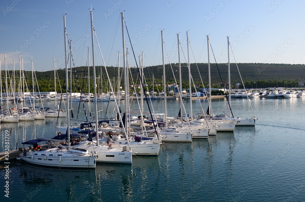 Boats, yachts, sailboats in the port of Sukosan, Croatia. Large concentration of ships in a small space.