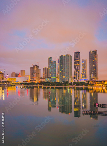 country skyline at sunrise downtown Miami Florida reflections buildings sky colors cityscape beautiful 
