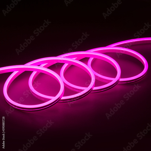 Flexible pink led neon decor christmas light on black backgroung