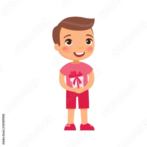 Little boy holding festive gift box flat vector illustration. Kid with Valentines Day, Birthday present. Smiling kid character with surprise. February 14 holiday isolated design element photo