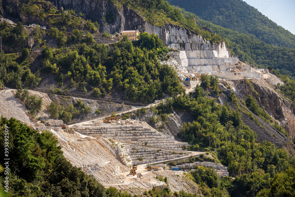 Outdoor quarry of white Carrara marble on the Apuan Alps (Alpi Apuane), Tuscany, Italy, Europe.
