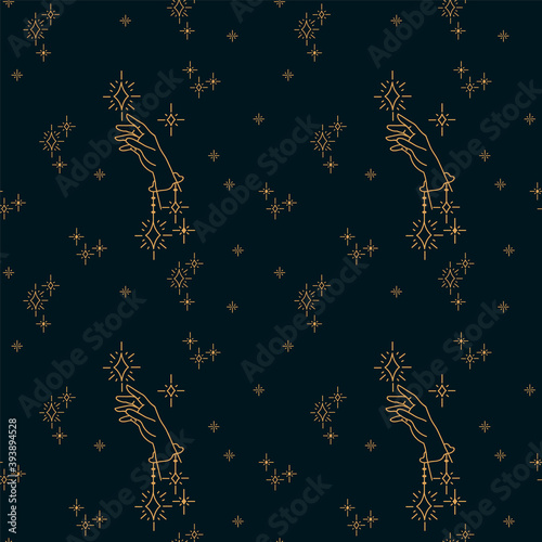The pattern of a mystic hand. Hand drawn with twinkling stars. Seamless Vector with elements of mysticism and esotericism. The background shows Hands reaching for the glittering stars in a black photo