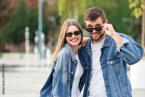 Young couple with stylish s...