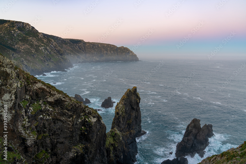 sunset on the wild rocky coast of Galicia in northern Spain