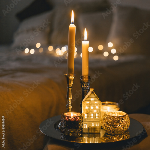 Obraz na plátne Burning candles in living room