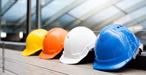 Multicolour Safety Construction Worker Hats. Teamwork of the construction team must have quality. Whether it is engineering, construction workers. Have a helmet to wear at work. For safety at work.